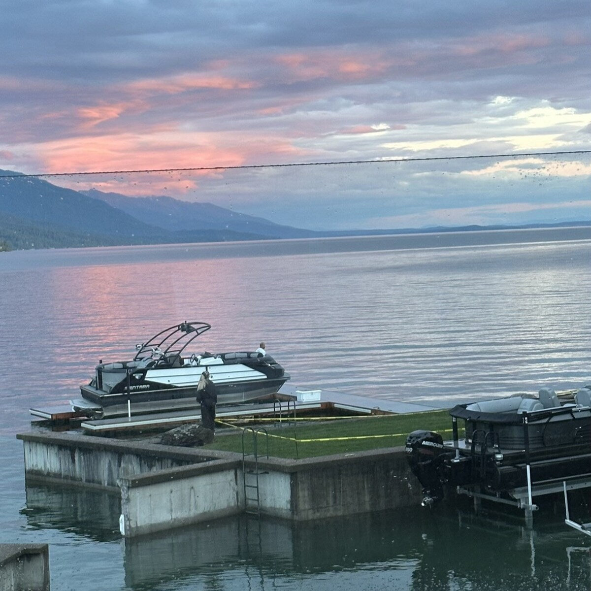 The boat tied up at sunset at The Driftwood