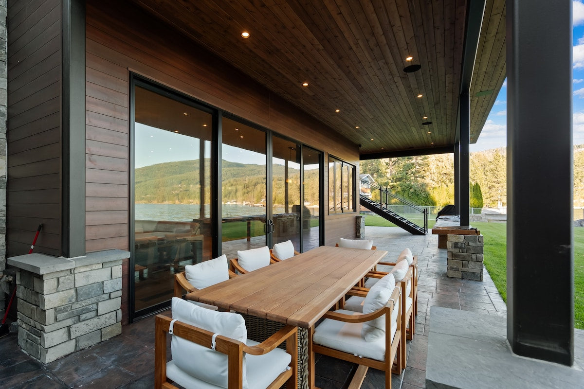 Outdoor dining under the overhang at The Driftwood