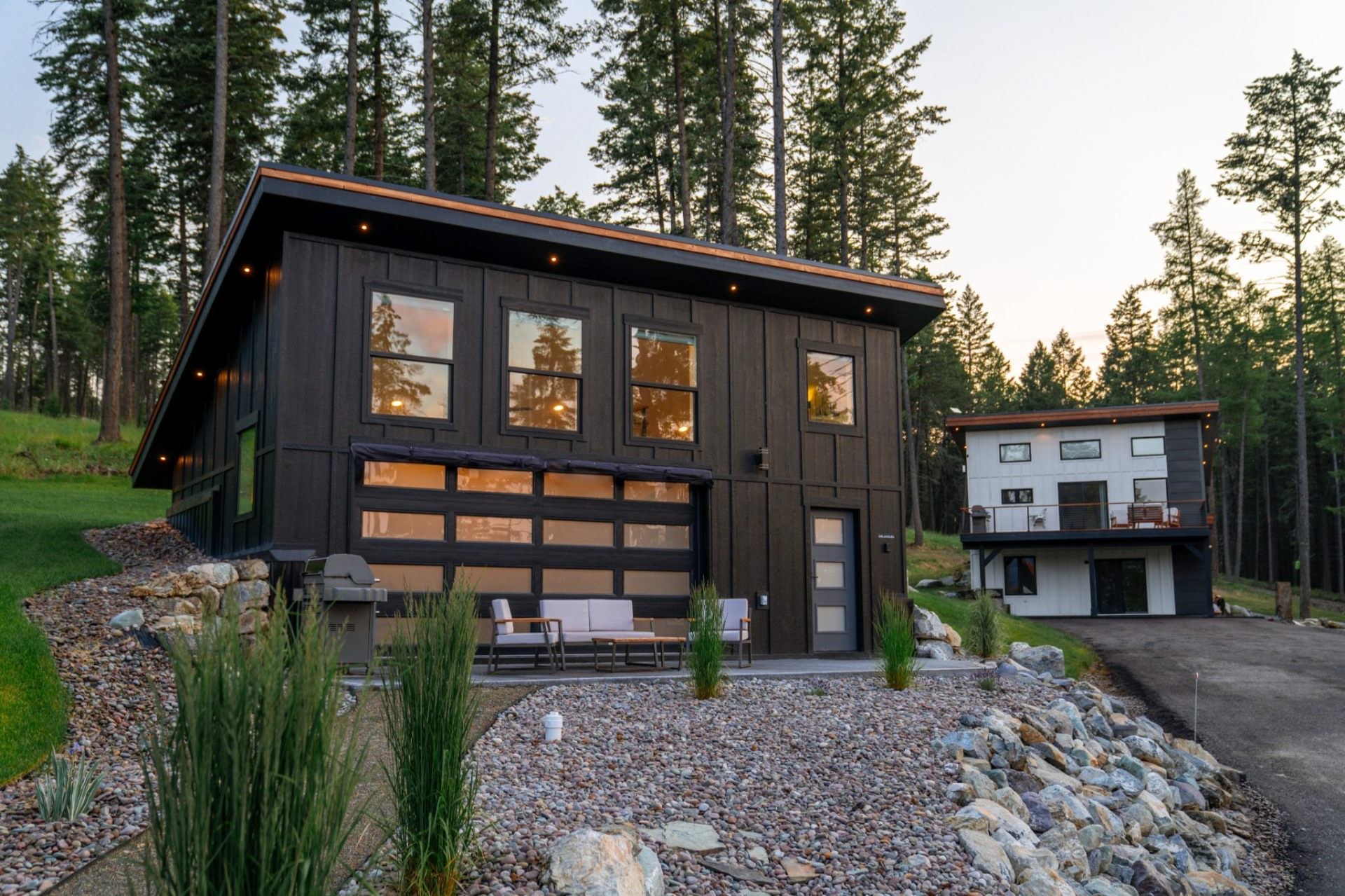 Two of the estate's accommodations at golden hour