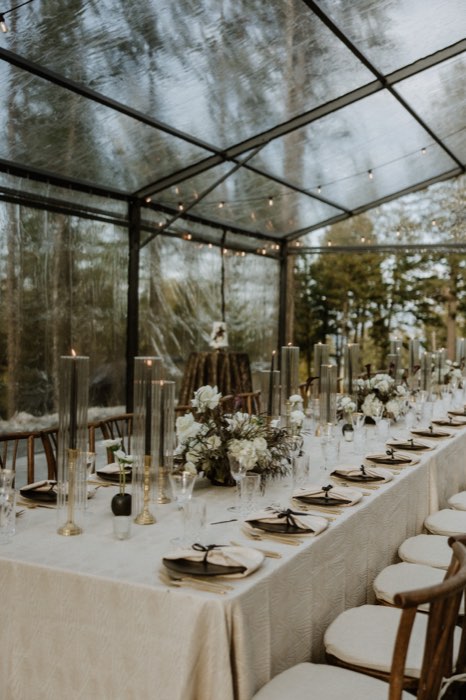 The reception tent set for dinner